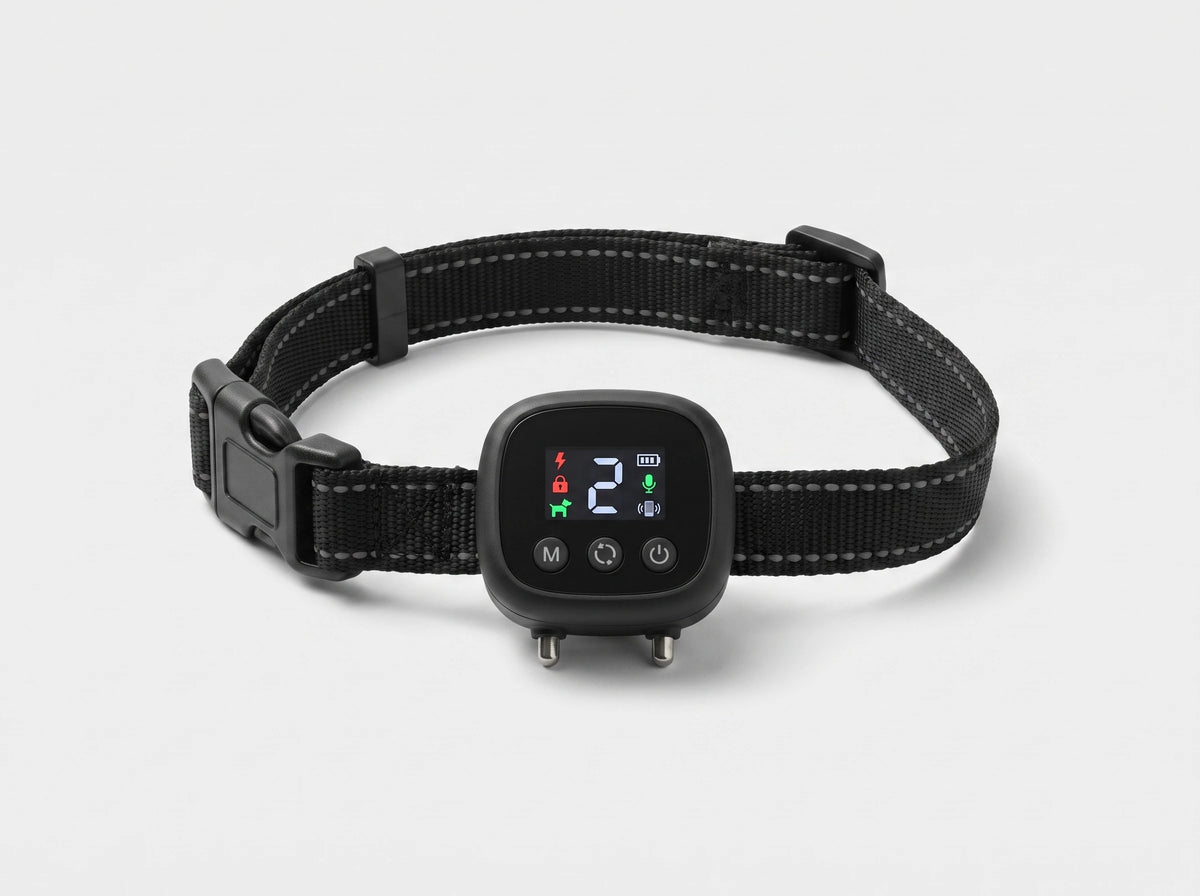 NooBark Anti-Bark Collar on a black strap with gray stitching, LED screen showing 2 above M, cycle and power buttons