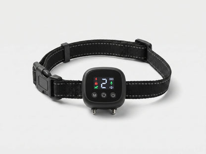 NooBark Anti-Bark Collar on a black strap with gray stitching, LED screen showing 2 above M, cycle and power buttons