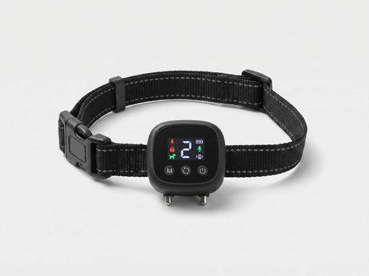 NooBark Anti-Bark Collar on a black strap with gray stitching, LED screen showing 2 above M, cycle and power buttons